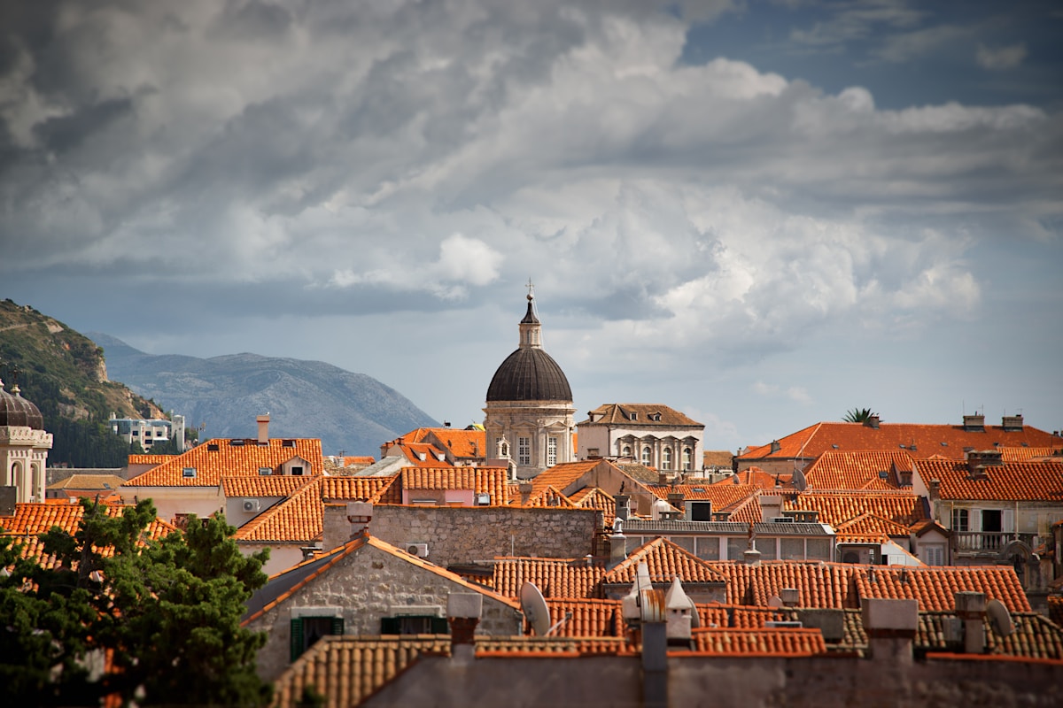 White domed tower above the red-tiled rooftops of Dubrovnik, Croatia