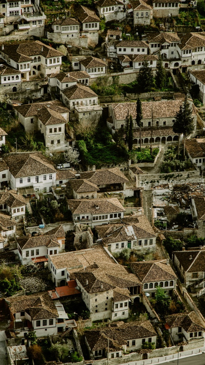 Aerial view of Berat old town with Ottoman houses and red-tiled roofs, Albania
