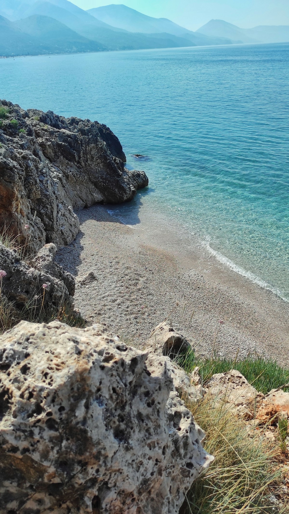 Rocky beach with clear water near Qeparo on the Albanian Riviera