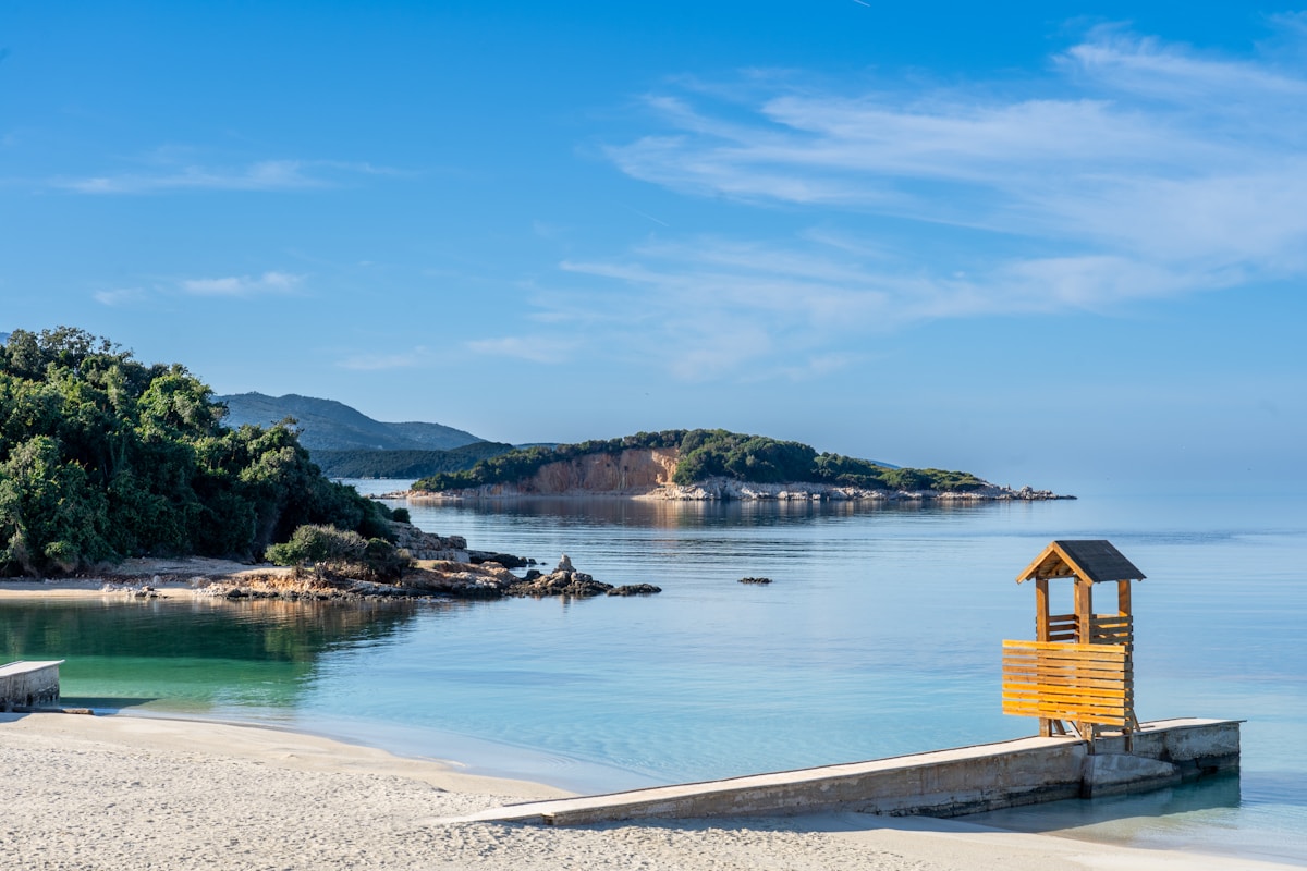 Sandy beach at Ksamil with clear Ionian water, Albania