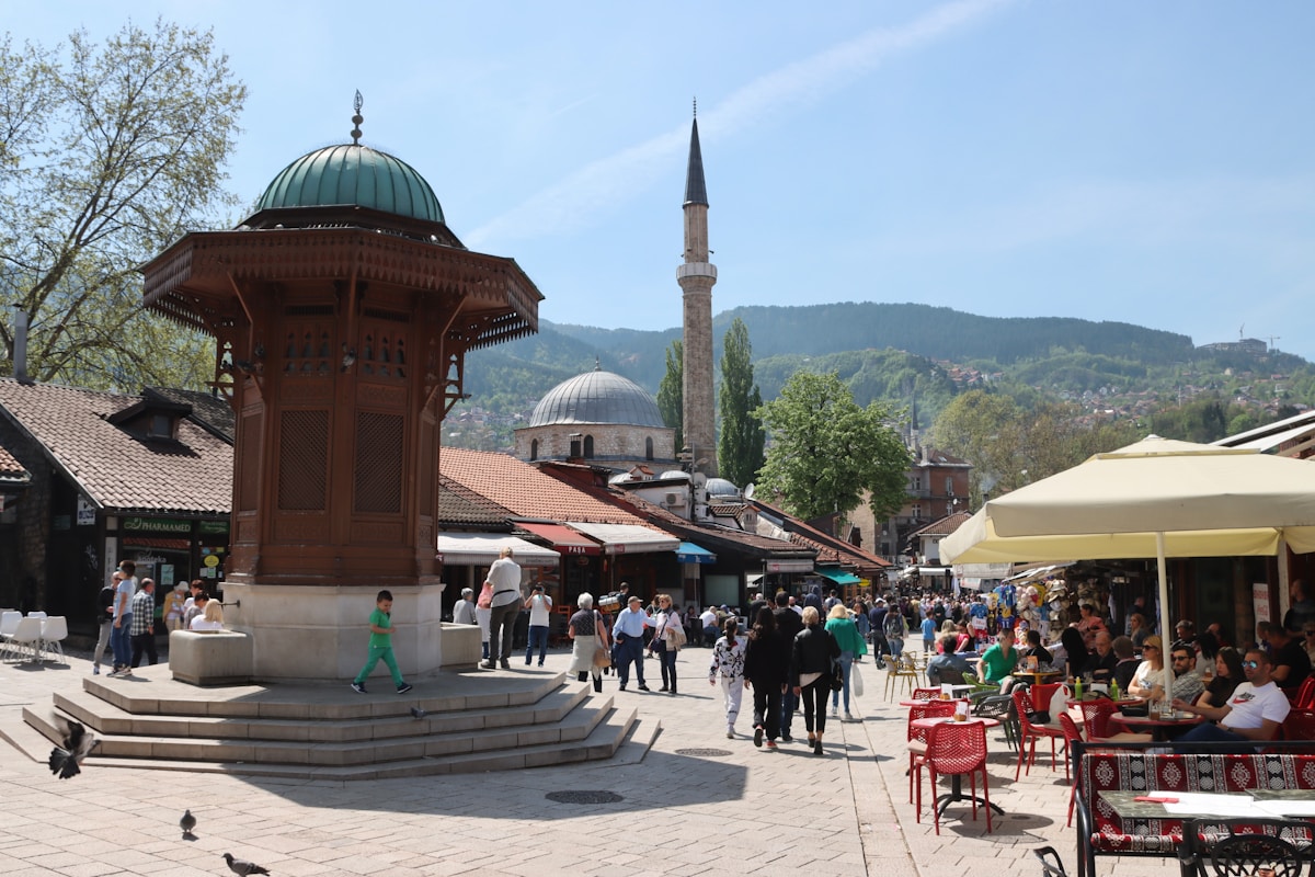 Crowd at a traditional market in Sarajevo, Bosnia and Herzegovina — Balkan food guide