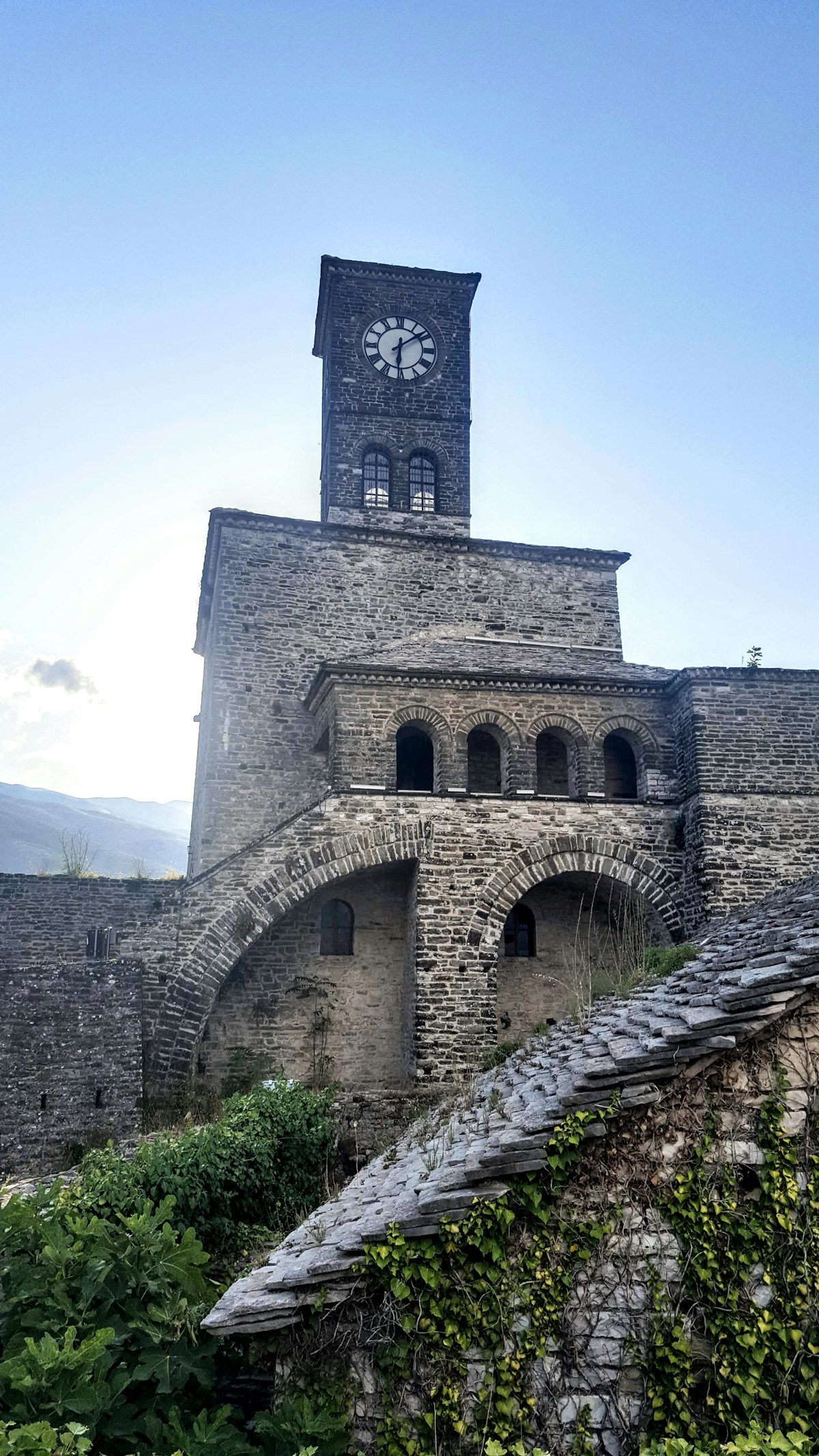 Stone building and cobblestone street in Gjirokaster, Albania