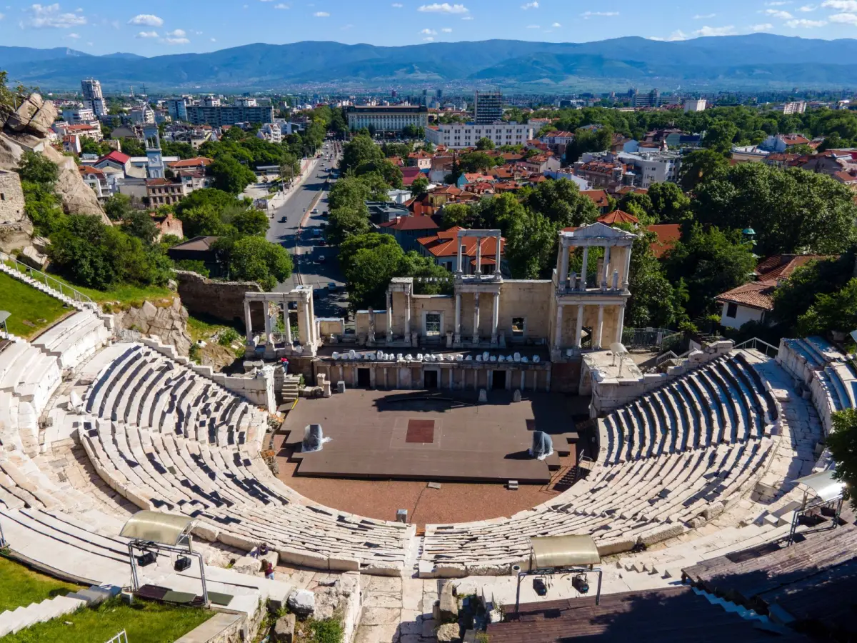 Roman Theatre and Plovdiv skyline with mountains behind, Bulgaria