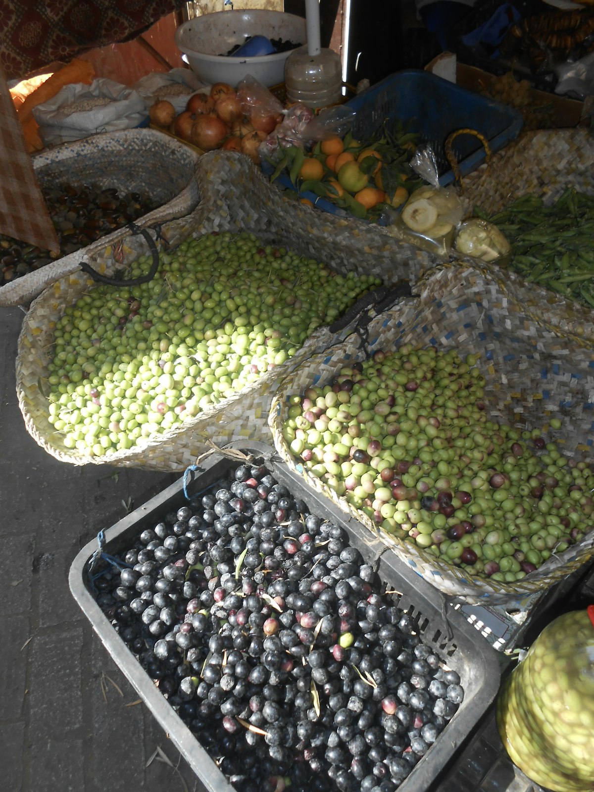 Fresh olives and produce at a traditional market in Montenegro