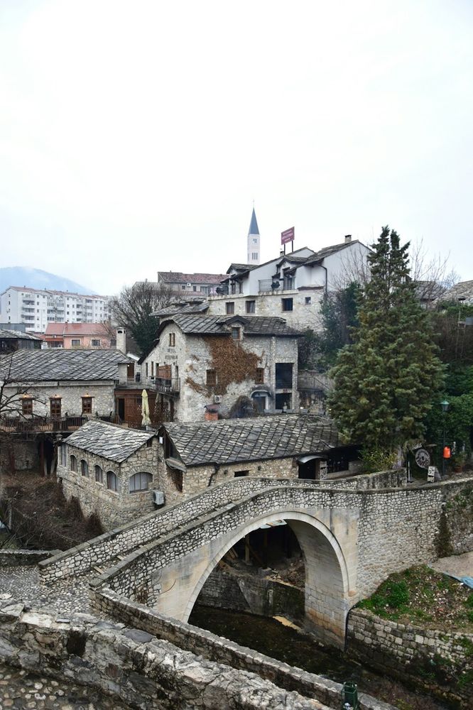 Old stone bridge over a river in Mostar, Bosnia and Herzegovina