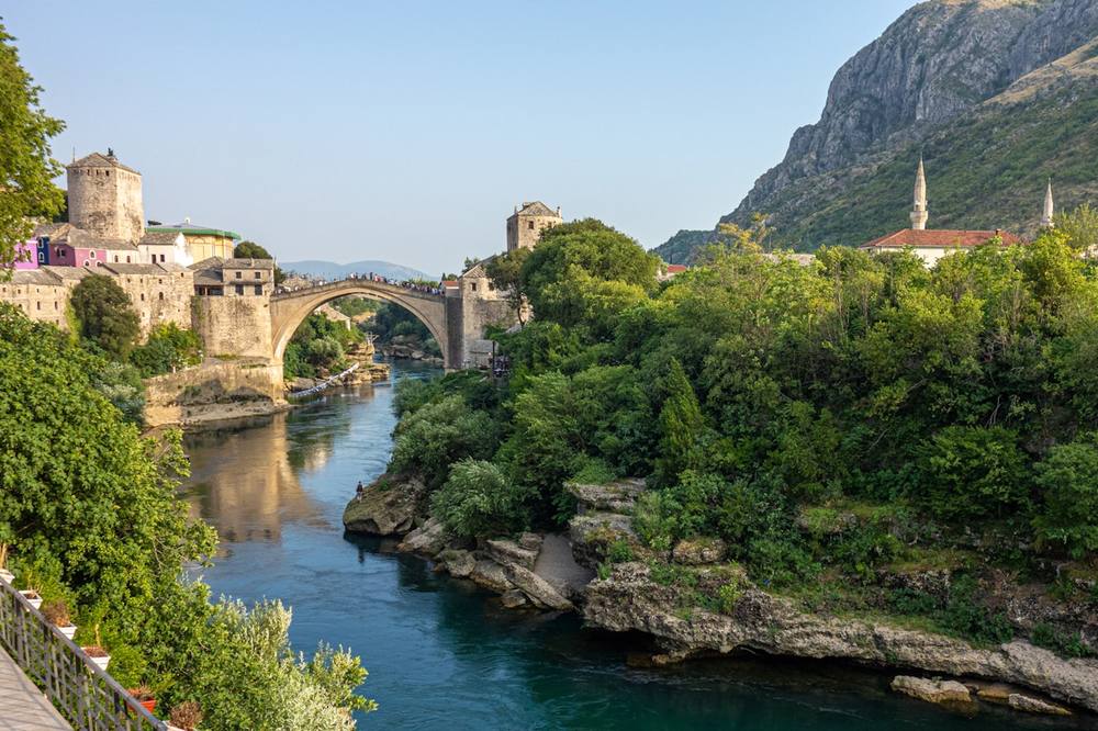 Brown bridge over the Neretva River in Mostar, Bosnia and Herzegovina