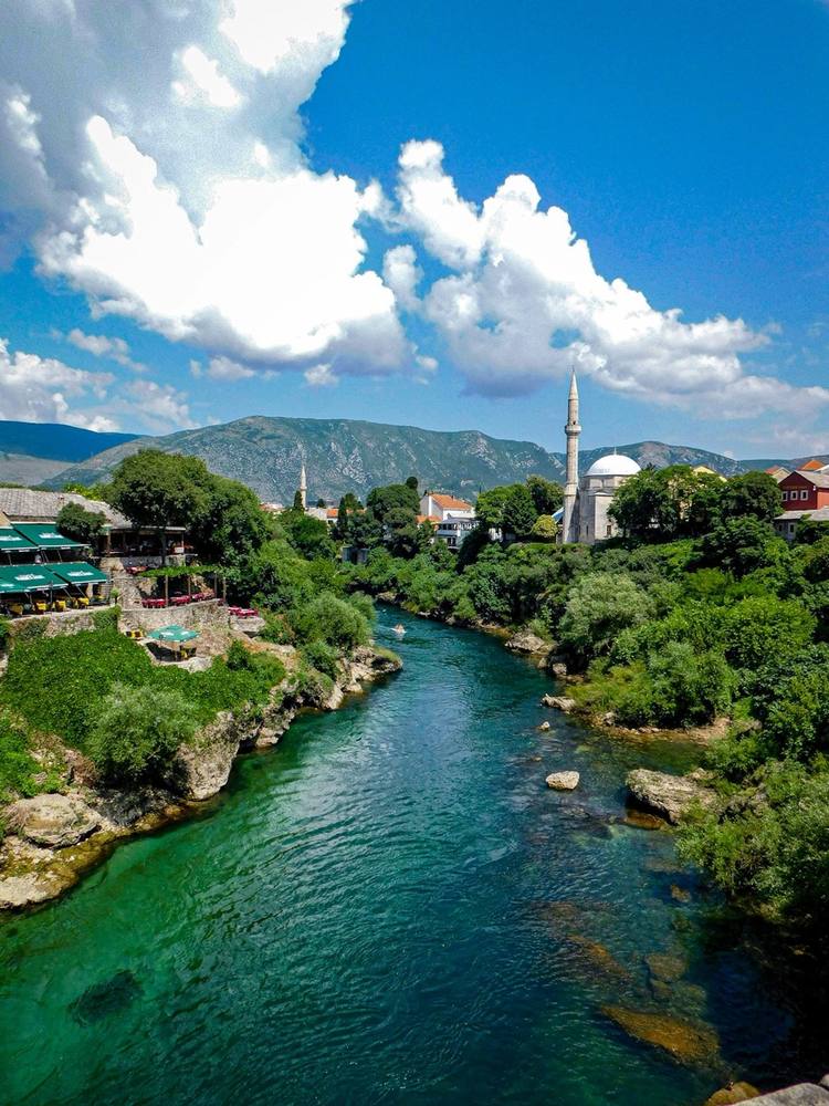 River flowing through lush countryside near Stari Most, Mostar, Bosnia