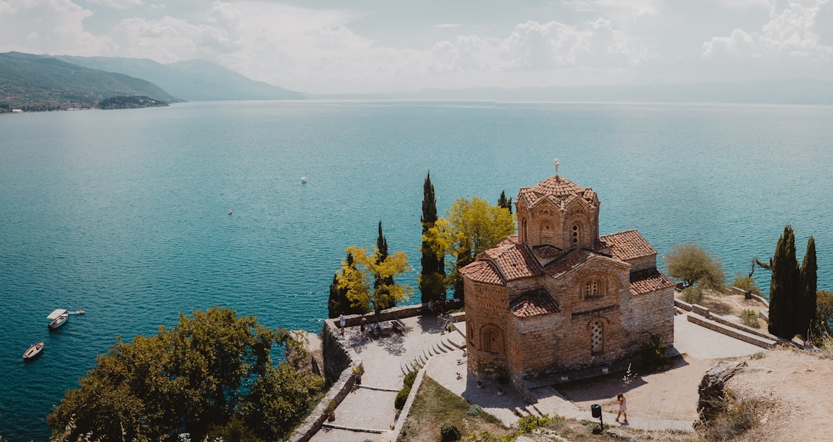 Elevated view of St John at Kaneo Church with turquoise Lake Ohrid, North Macedonia