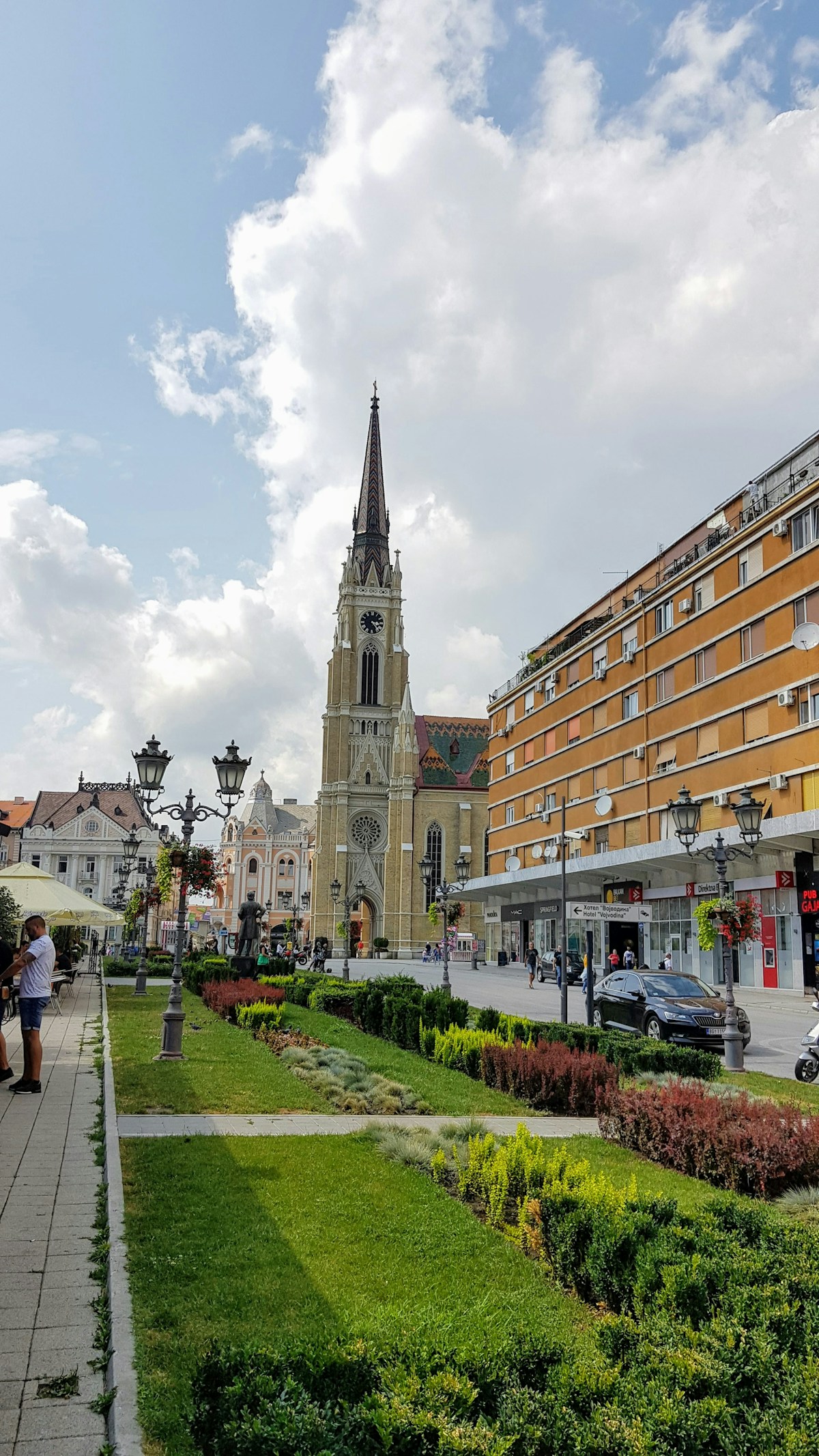 People near a building in Novi Sad, Serbia