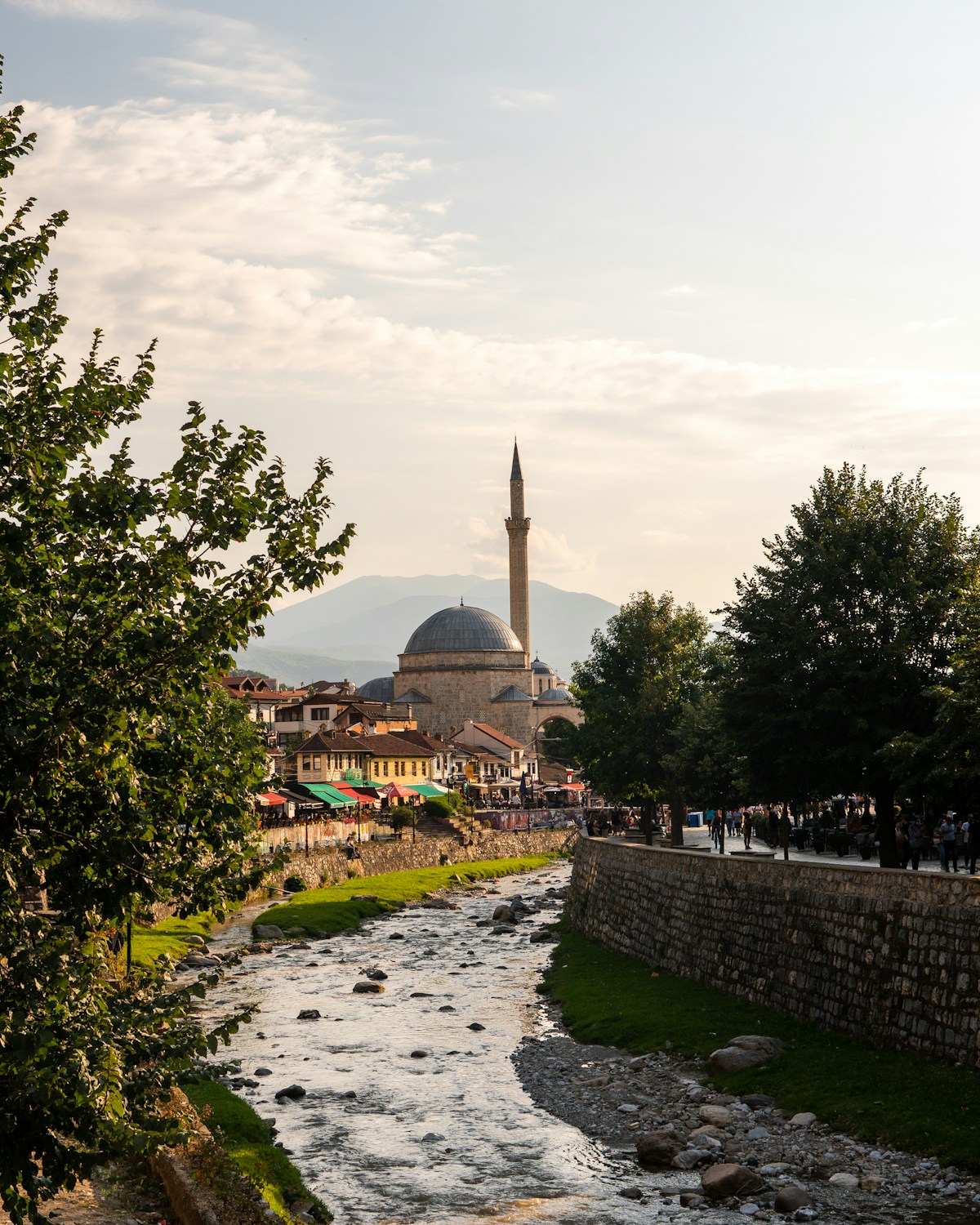 Mosque with minaret overlooking river in Prizren, Kosovo