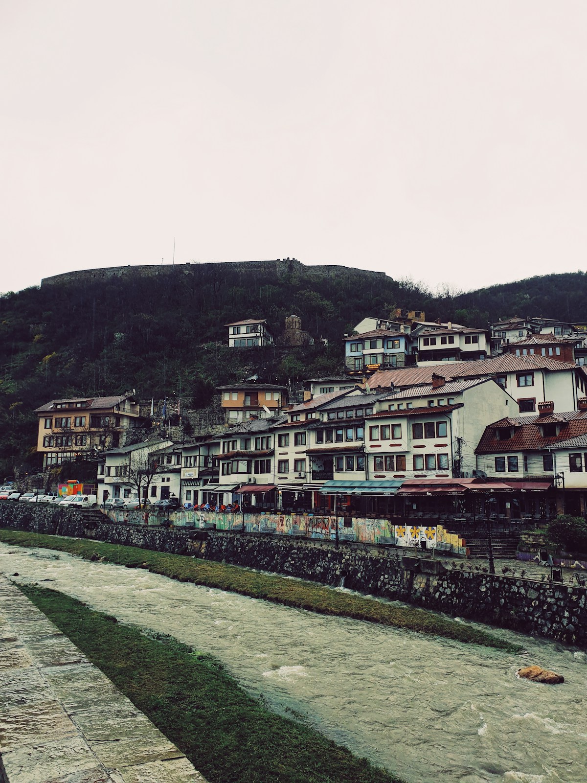 River running through Prizren with hillside, Kosovo