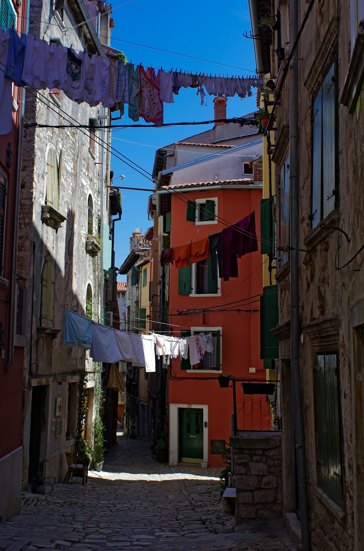 Narrow street with laundry in Rovinj, Istria, Croatia