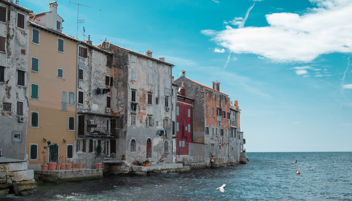 Red and white building beside the Adriatic in Rovinj, Croatia