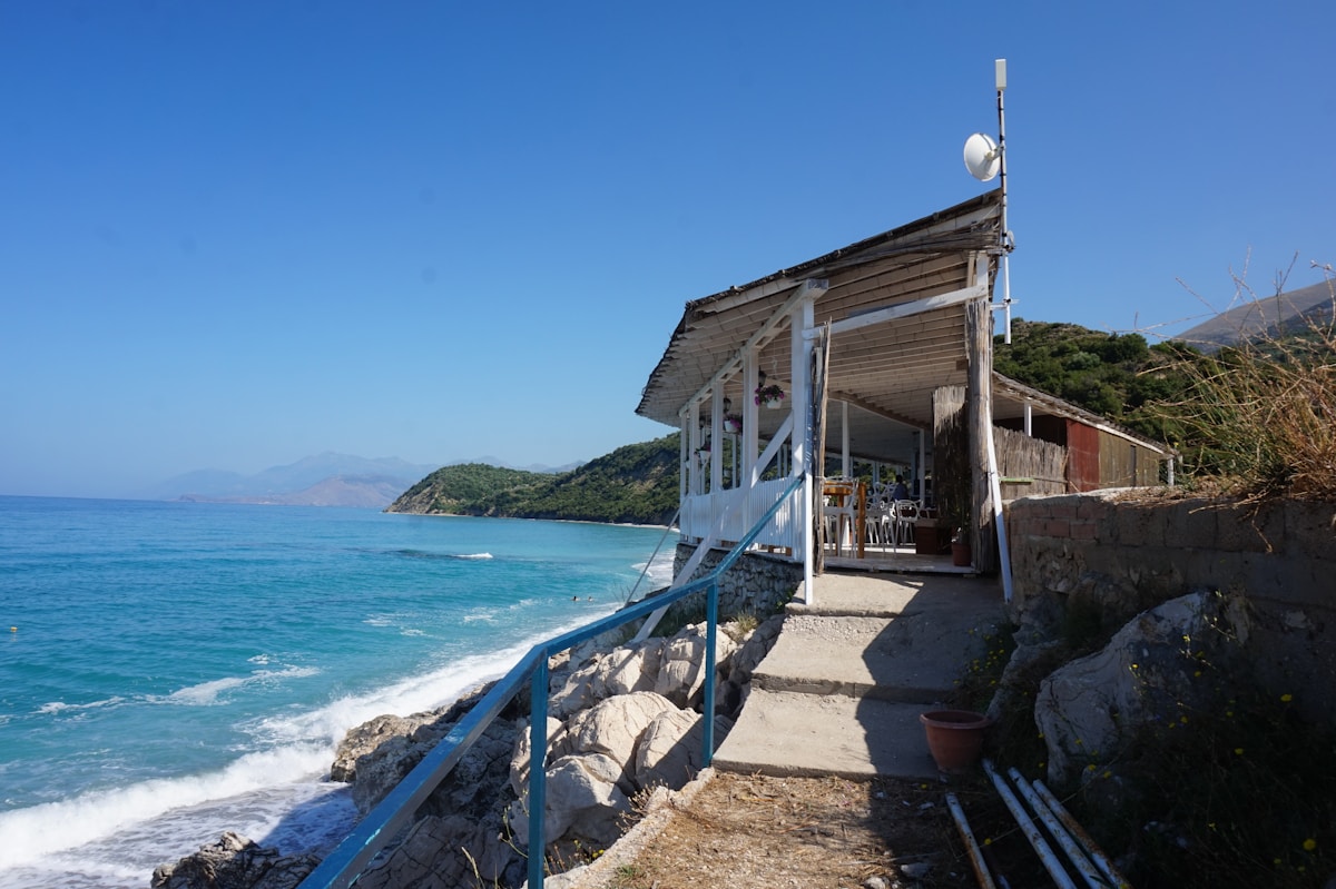 Small beach bar and sunbeds near Shpella beach on the Albanian Riviera