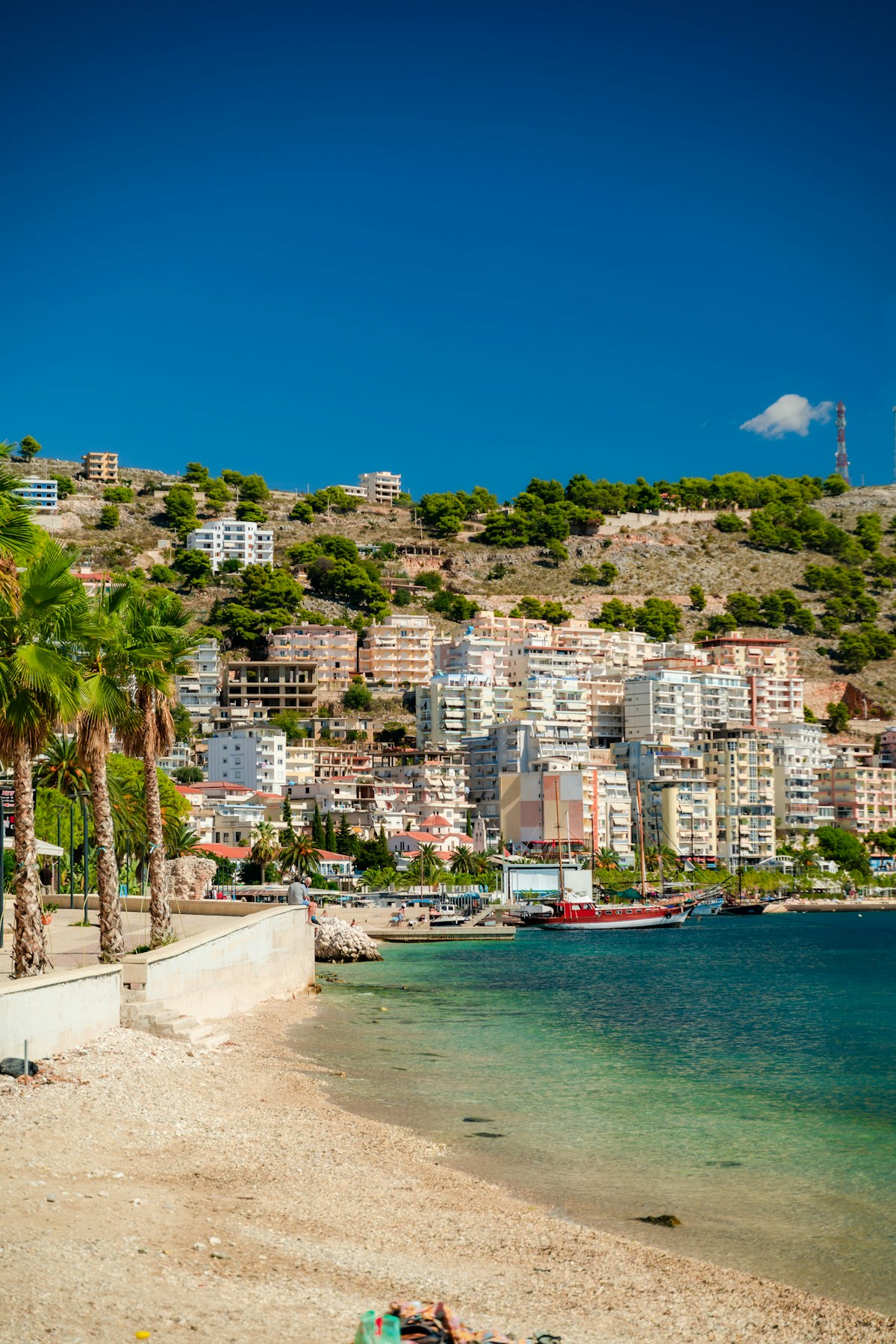 Seafront promenade and white buildings along the Ionian coast of Saranda, Albania