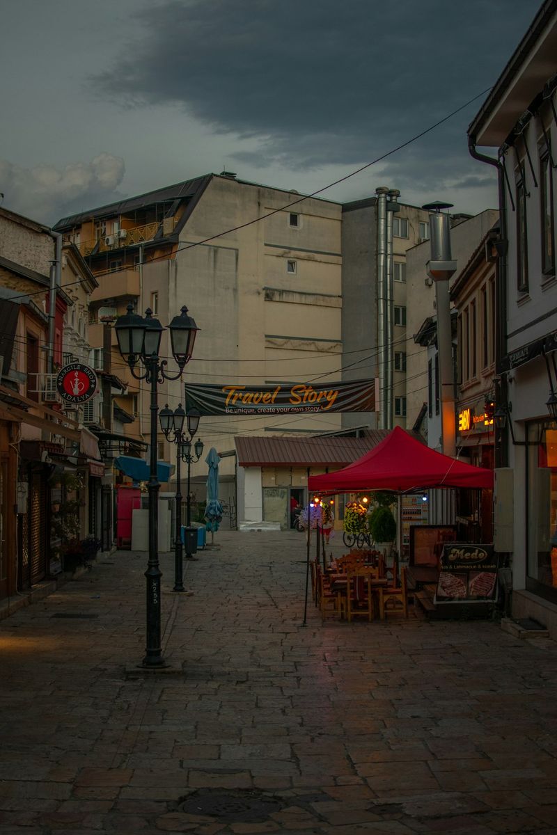 Old Bazaar street in Skopje with restaurant terrace and lanterns, North Macedonia
