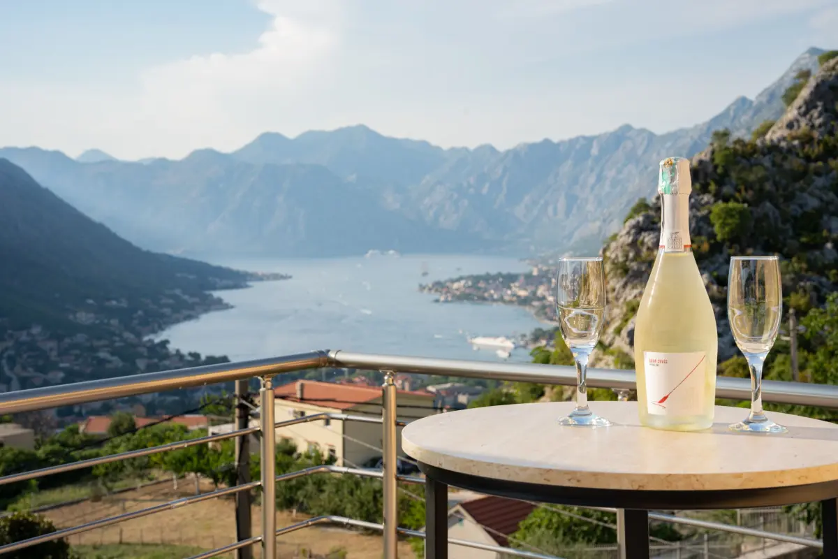 Champagne on a terrace overlooking Kotor Bay, Montenegro