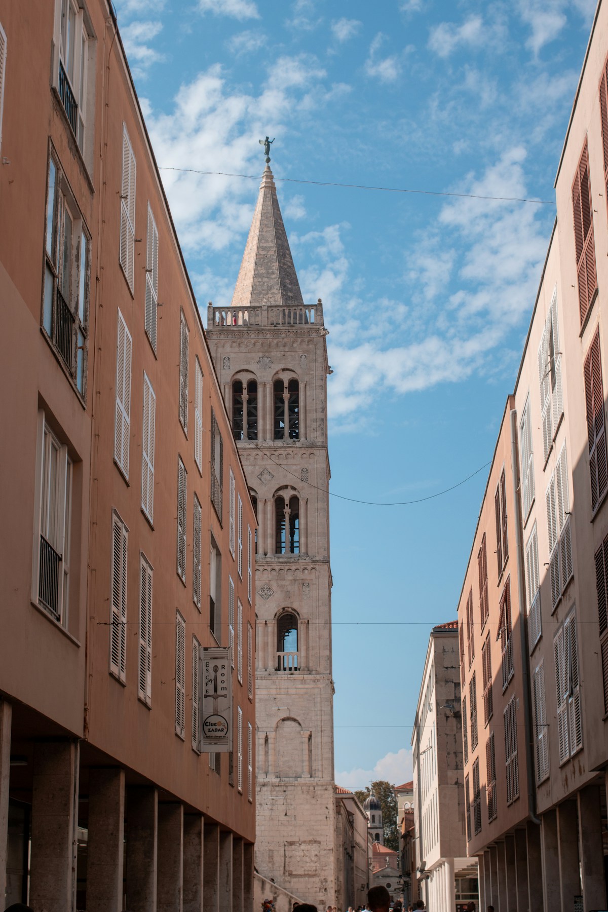 Clock tower rising above the streets of Zadar, Croatia