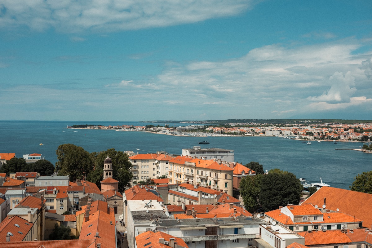 Zadar coastal city skyline with red rooftops and blue sky, Croatia